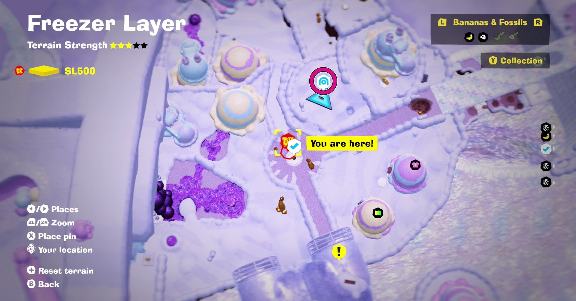 Uma captura de tela de Bananza Kong Donkey Kong mostrando o mapa de uma área na camada de freezer e o ícone do gongo de urdidura.