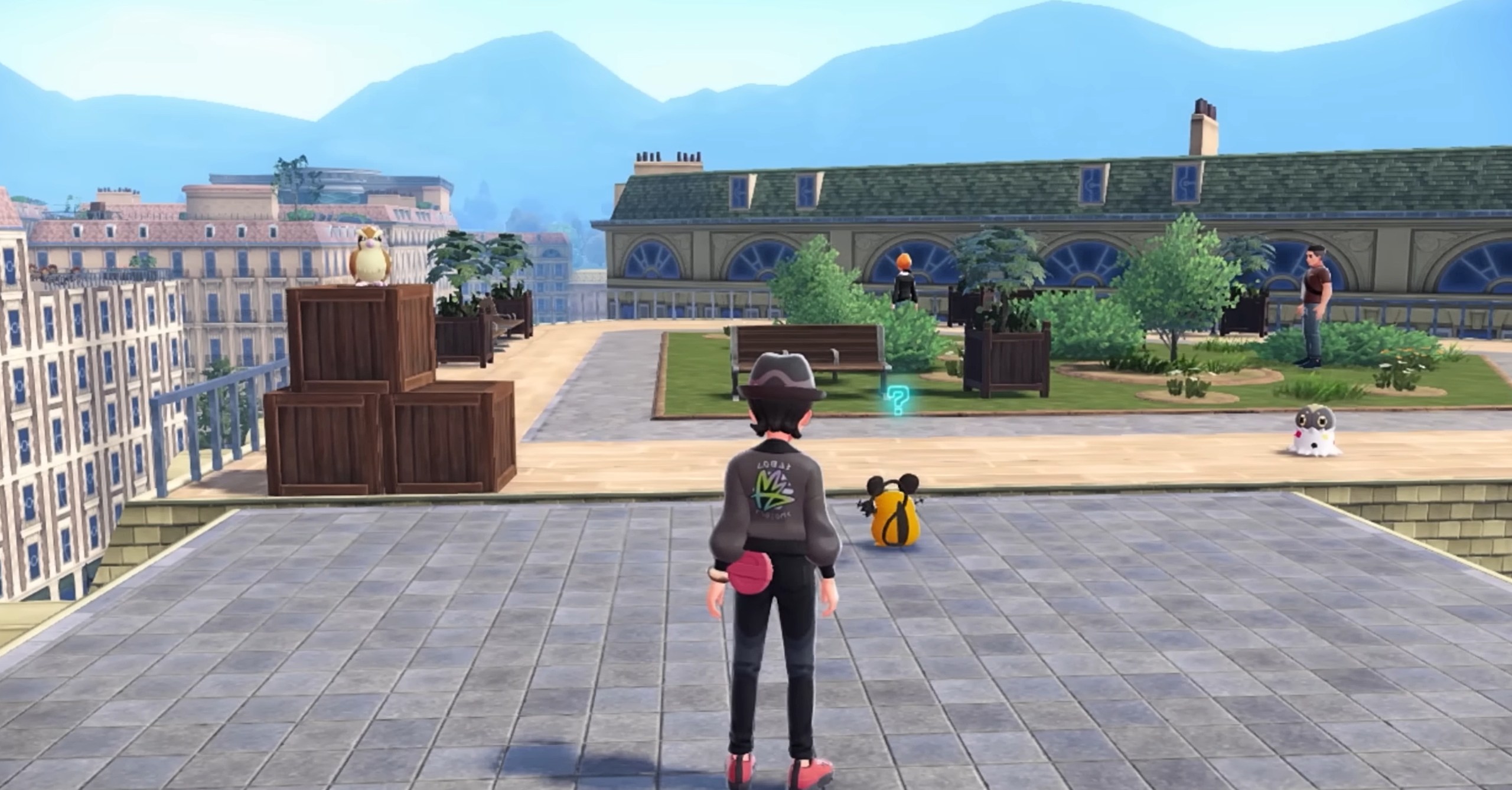 Um treinador de Pokemon em Legends Za se aproximando de dois Pokémon em um telhado, ambos apenas de pé ali
