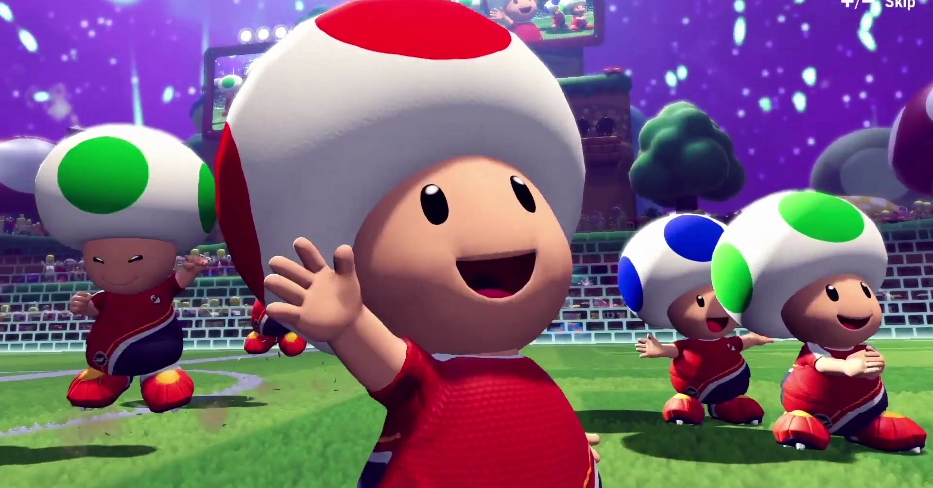 Toad e sua equipe de sapo comemorando após um gol em Mario Strikers: Battle League