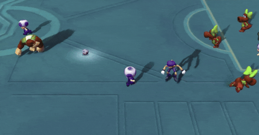 Toad Rams Donkey Kong no chão em Super Mario Strikers