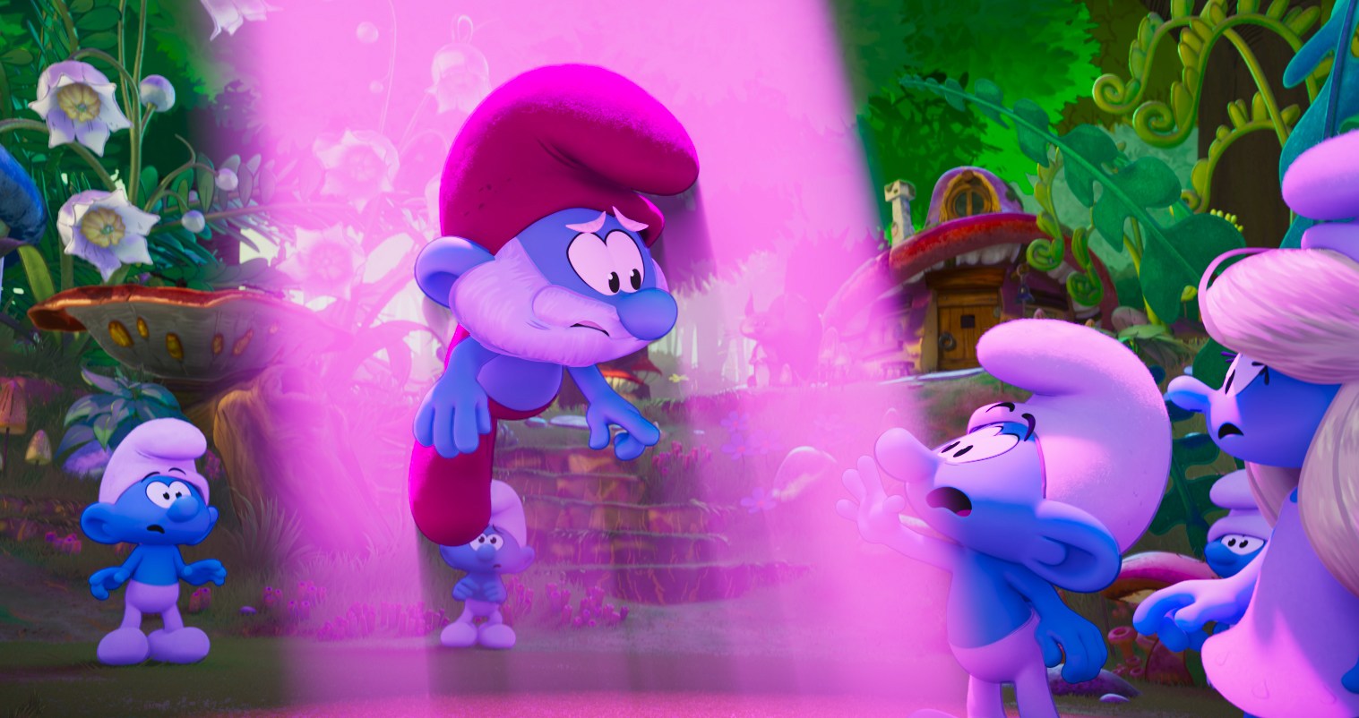 Papa Smurf é sugado em um feixe de trator roxo no filme de 2025 Smurfs