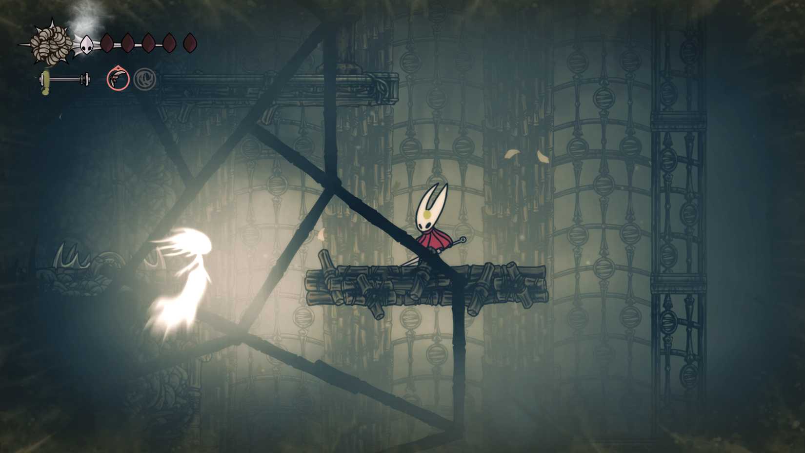 Um Wraith e uma armadilha de urso na região da névoa em Hollow Knight: Silksong.