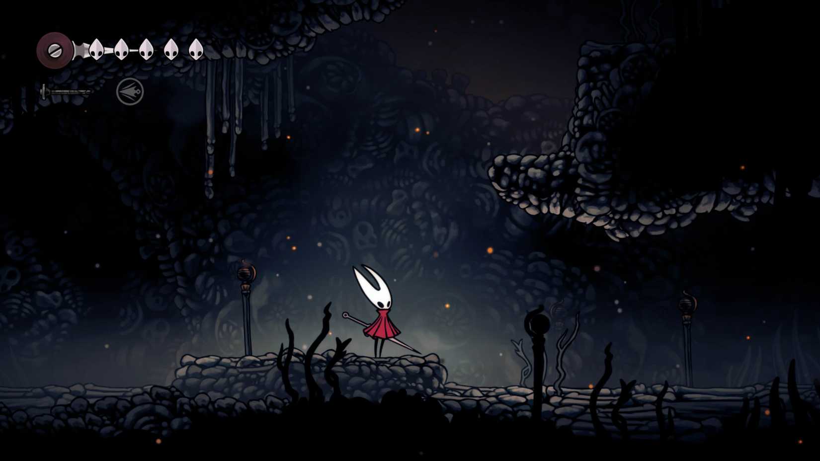 Hornet fica sob uma borda perto do fundo do osso enquanto procura o mapa de Silksong