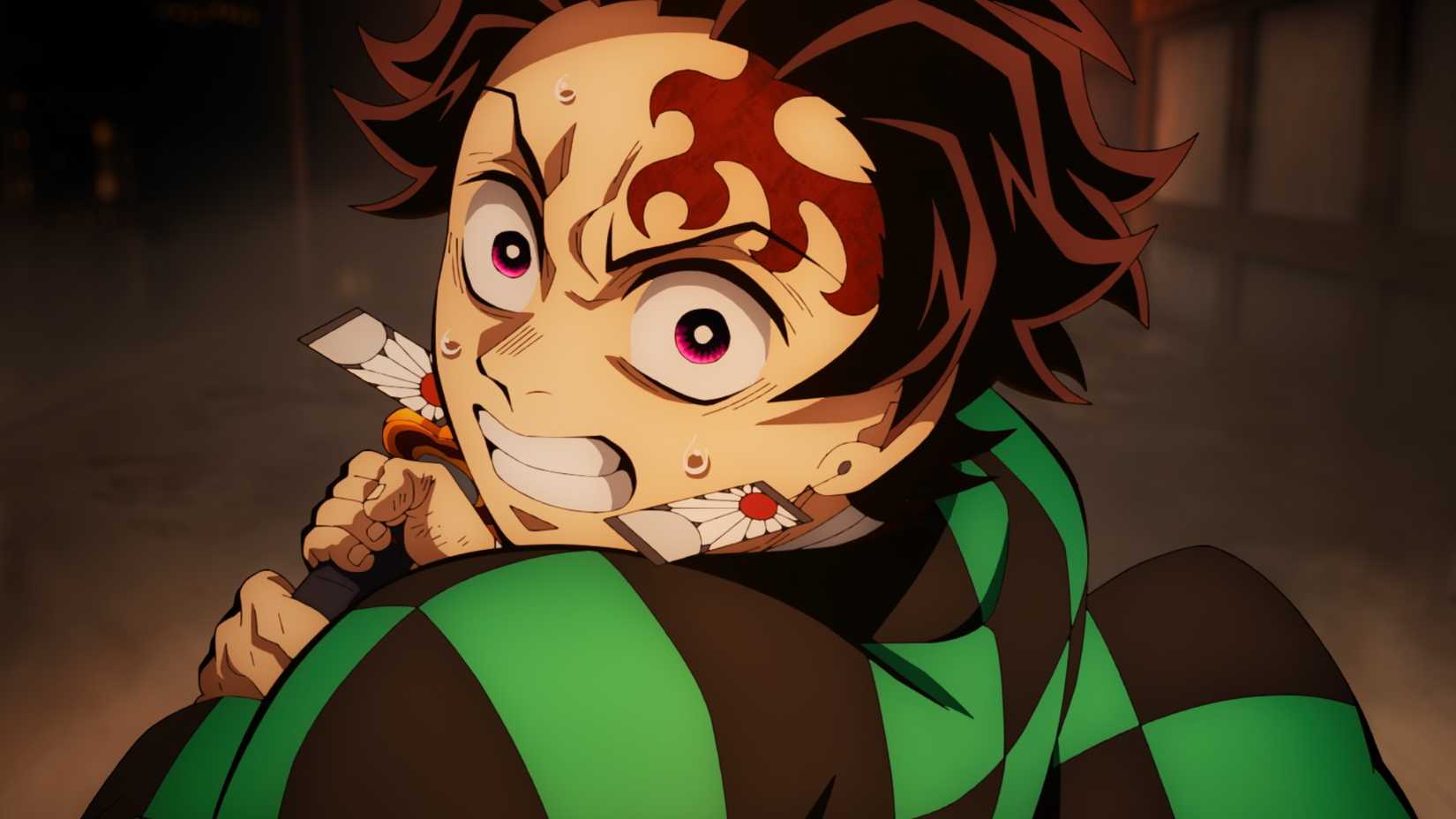 Tanjiro Kamado balançando sua espada em um parado do castelo de Demon Slayer Infinity