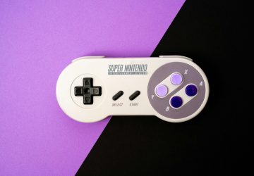 white and black game controller