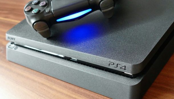 a video game console sitting on top of a wooden table