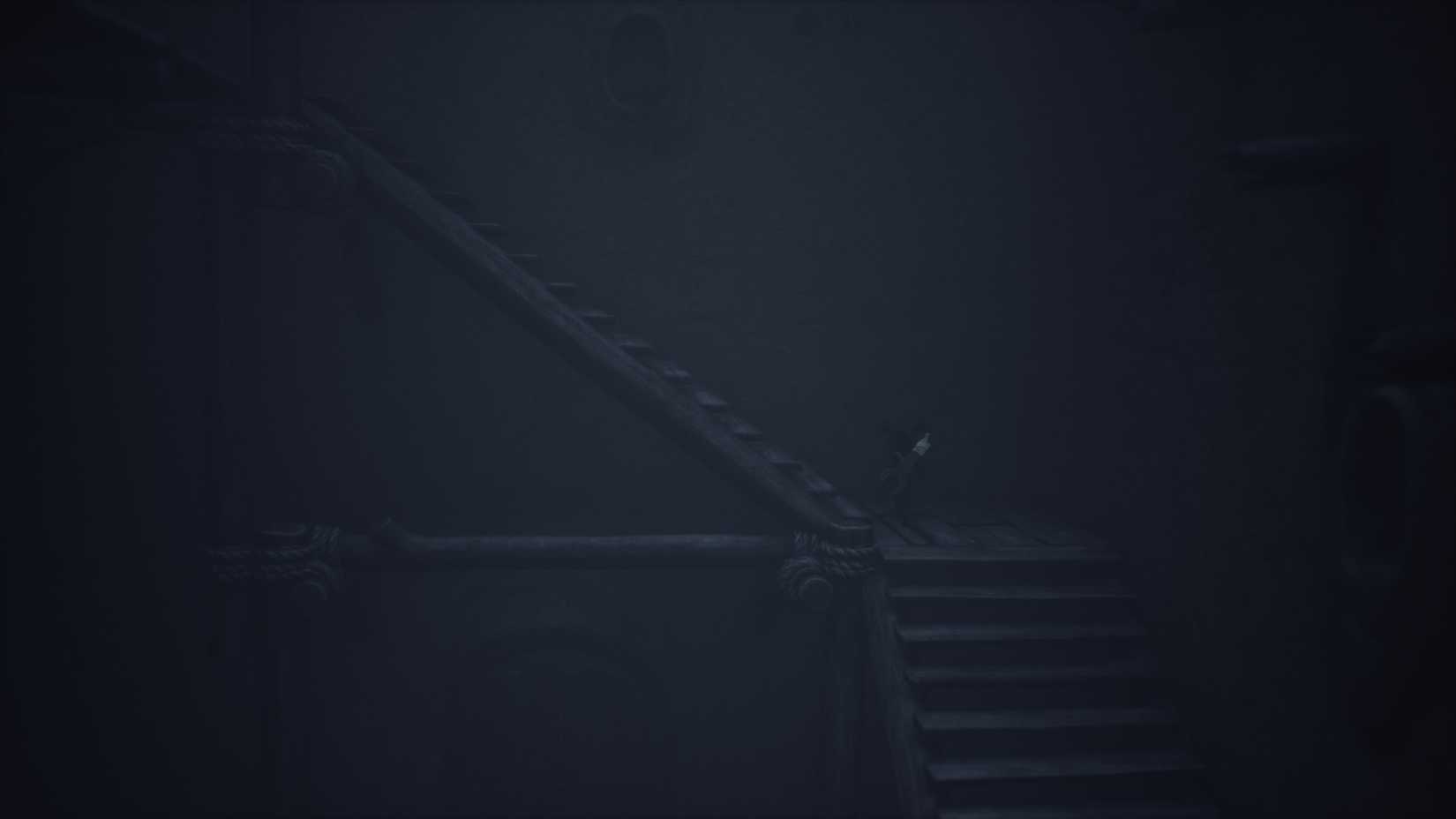 Uma escadaria extremamente escura de Little Nightmares 3.