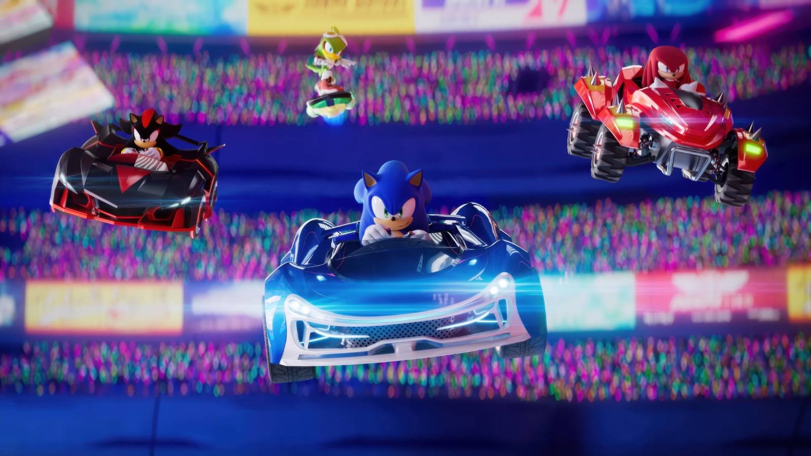 Sonic, Shadow e Knuckles dirigindo carros e Jet the Hawk andando de prancha em Sonic Racing: CrossWorlds.