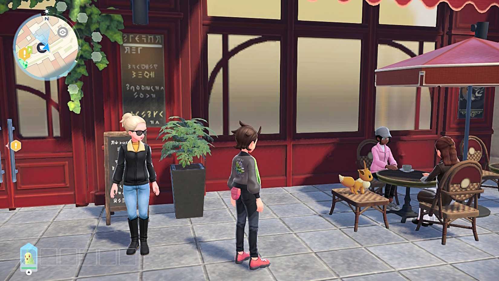 Pessoas em um café em Pokémon Legends ZA