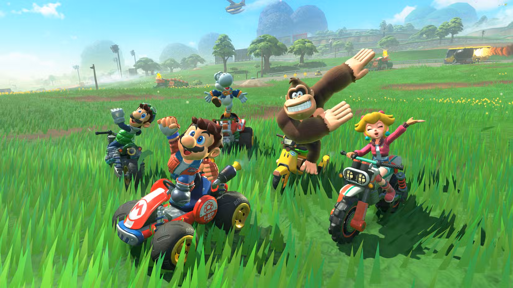Mario, Donkey Kong e amigos posam em seus karts no modo free roam em Mario Kart World