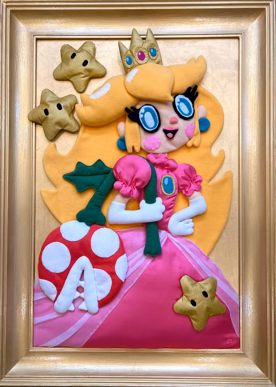 Uma mostra de arte da Princesa Peach feita como uma colagem de feltro.