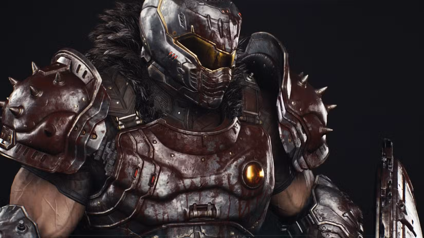 Uma foto em close do Doom Slayer em Doom: The Dark Ages usando uma armadura cinza metálica coberta de sangue. Há um distintivo amarelo no lado esquerdo do peito.