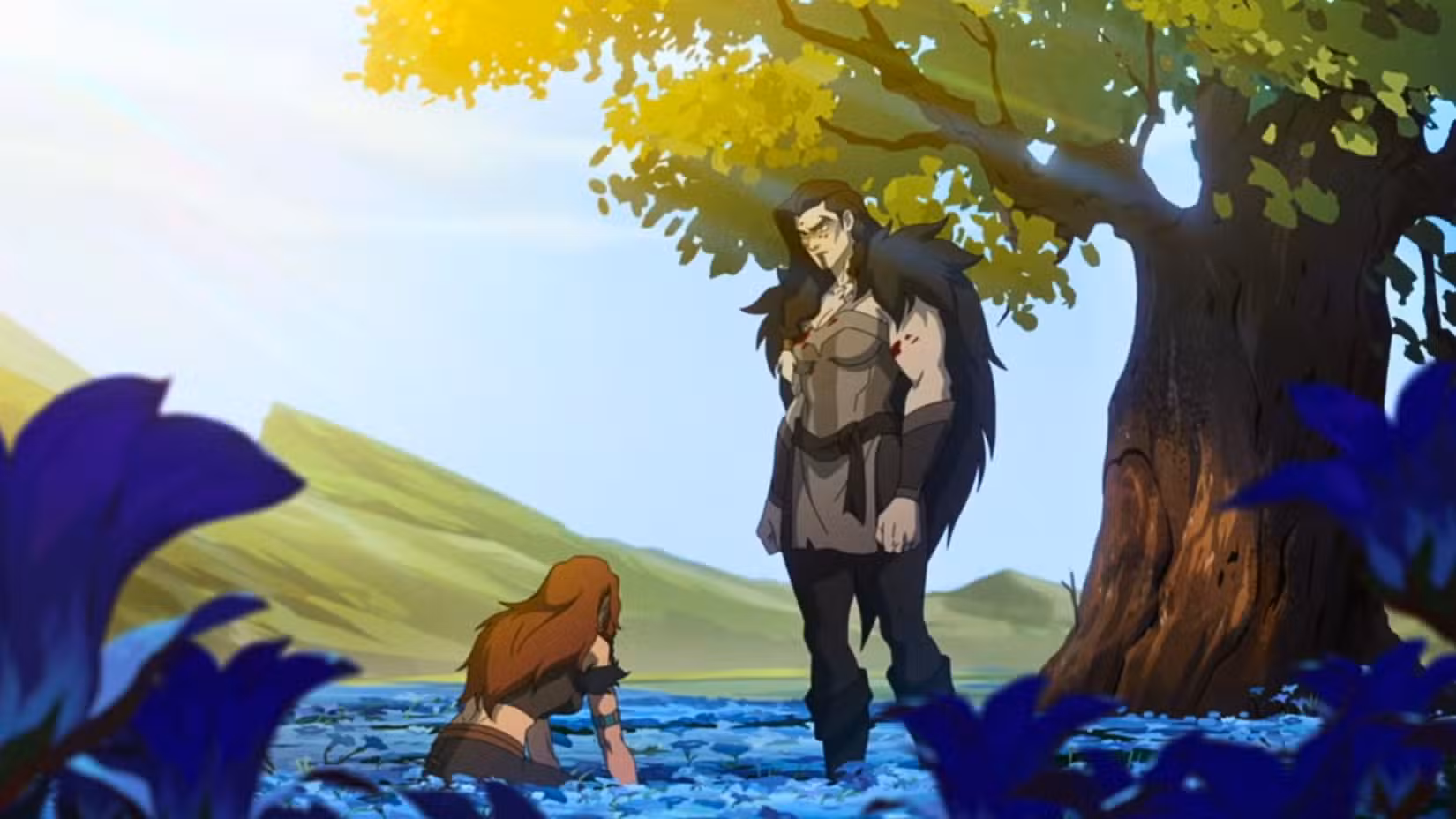 Uma imagem de O Poderoso Nein. Mostra Yasha, uma mulher bárbara forte e musculosa, parada entre um campo de flores azuis. Uma mulher de cabelos castanhos está ajoelhada diante dela.