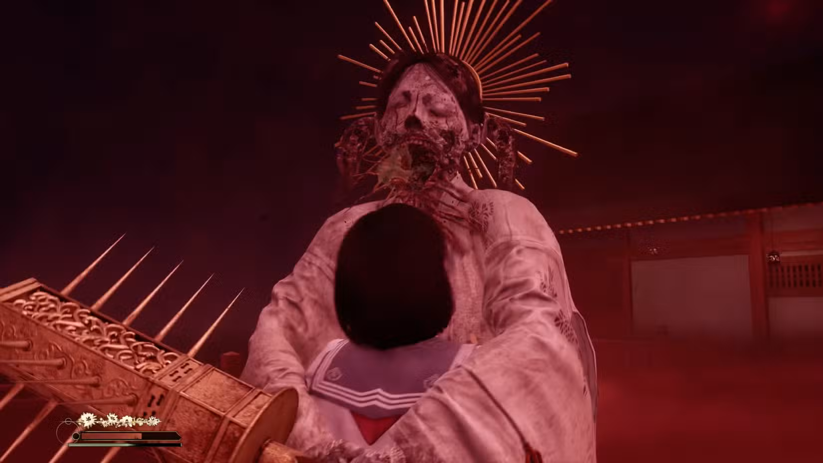 A Entidade semelhante a Sakuko força Hinako a um abraço sufocante, momentos antes de tentar comer seu rosto.