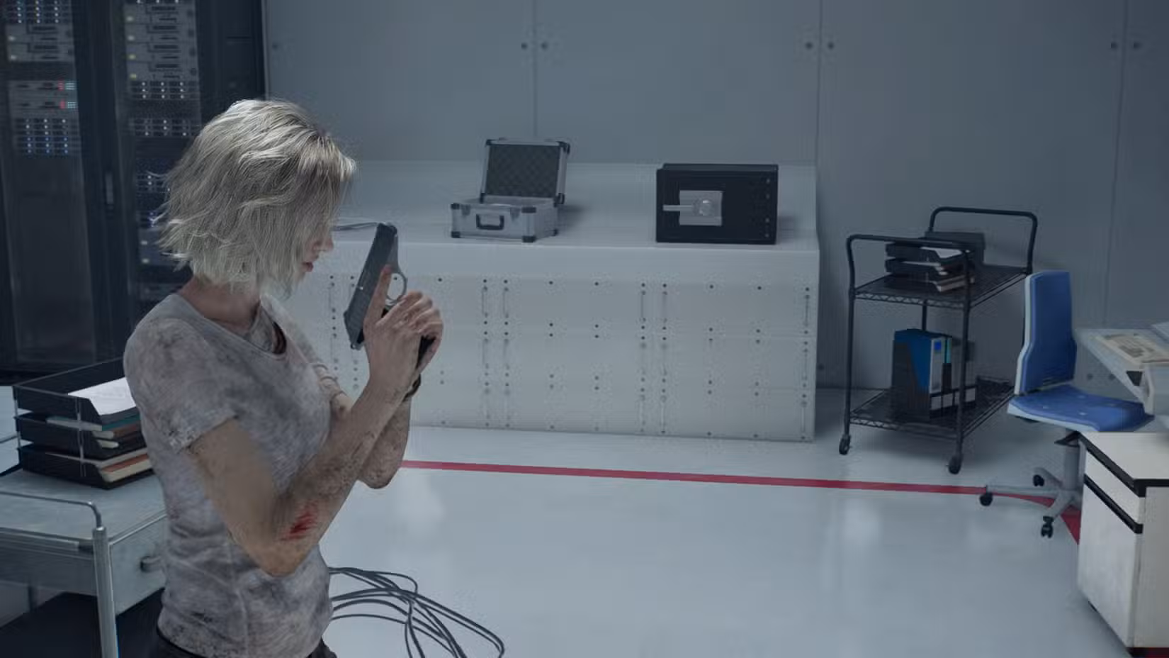 Uma captura de tela de Resident Evil Requiem mostrando Grace na frente do cofre na Sala de Controle do Monitor