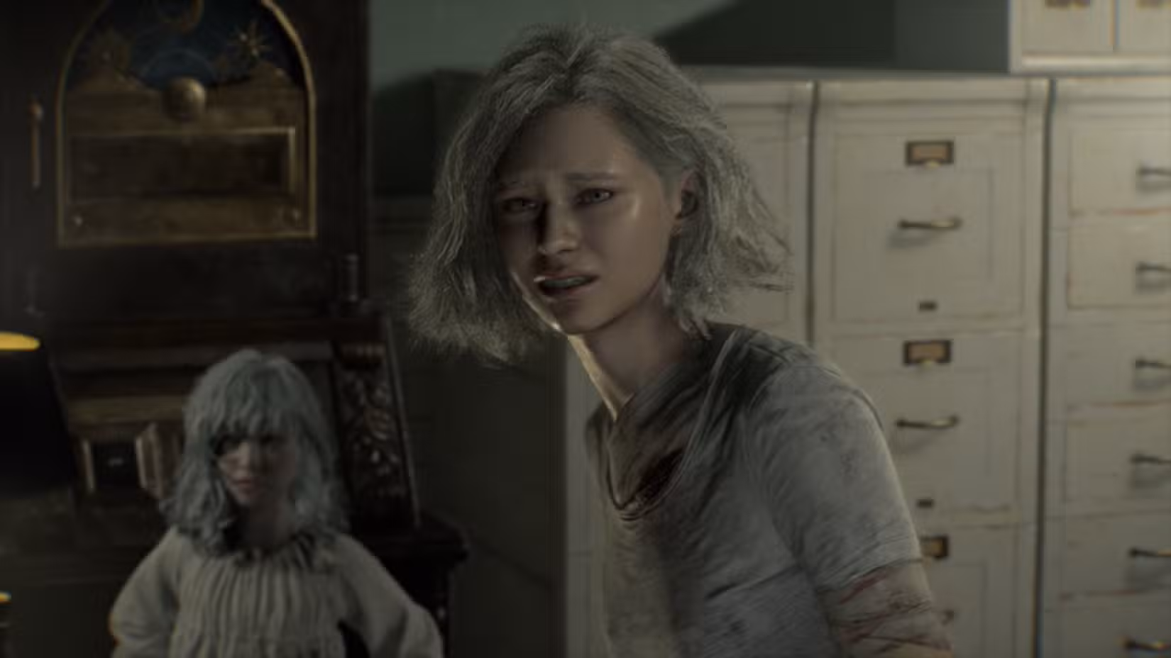 Grace parada na frente de Emily e enfrentando uma ameaça em Resident Evil Requiem