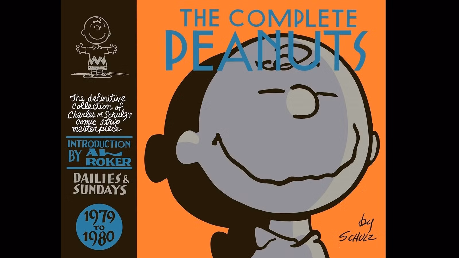 A capa de The Complete Peanuts: Volume 15 da Fantagraphics Books, apresentando Charlie Brown com um enorme sorriso no rosto