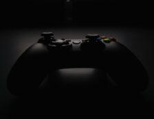 shallow focus photography of black Xbox controller