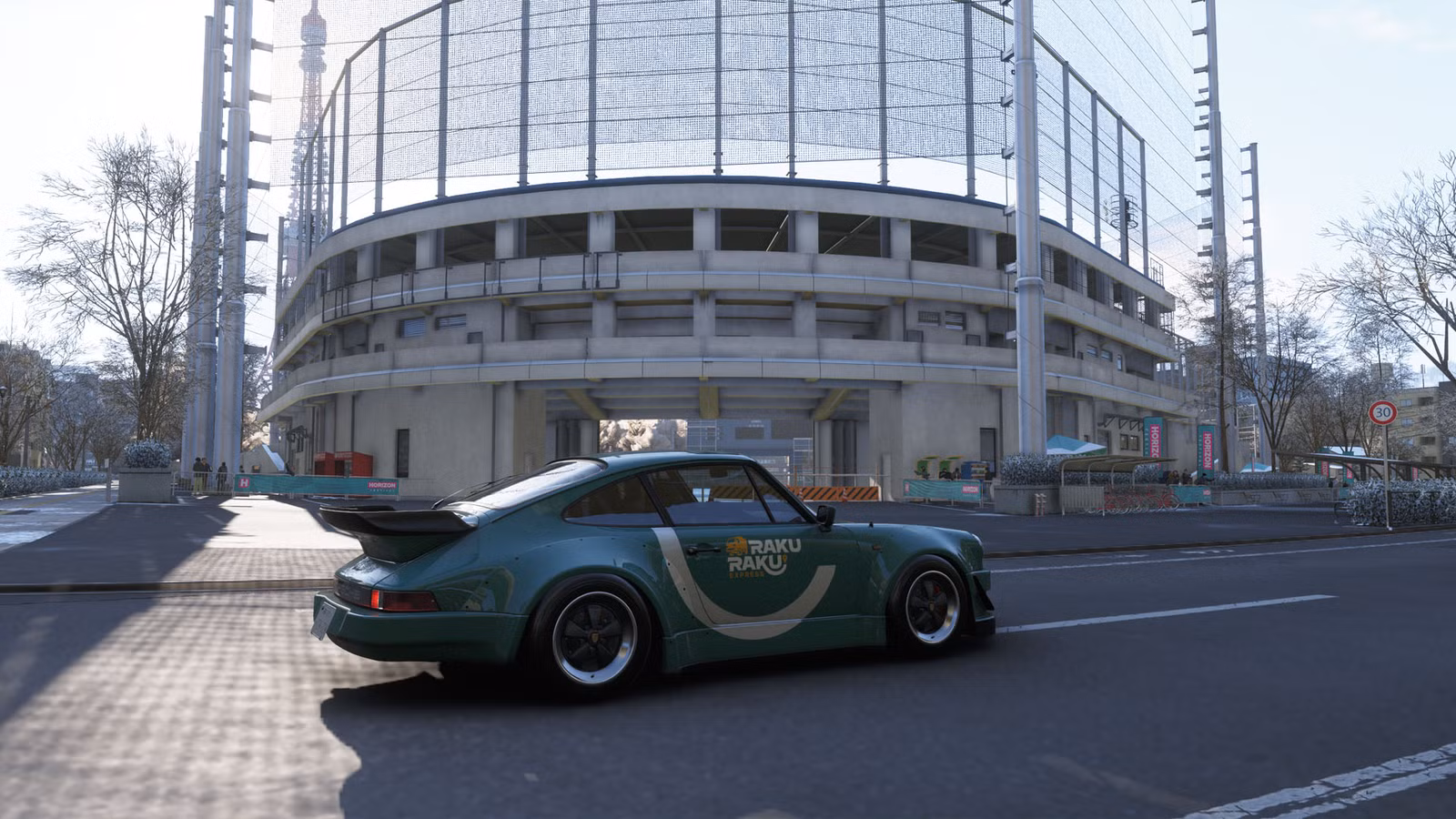Um Porsche azul esverdeado sentado em frente a um estádio de beisebol no Forza Horizon 6.