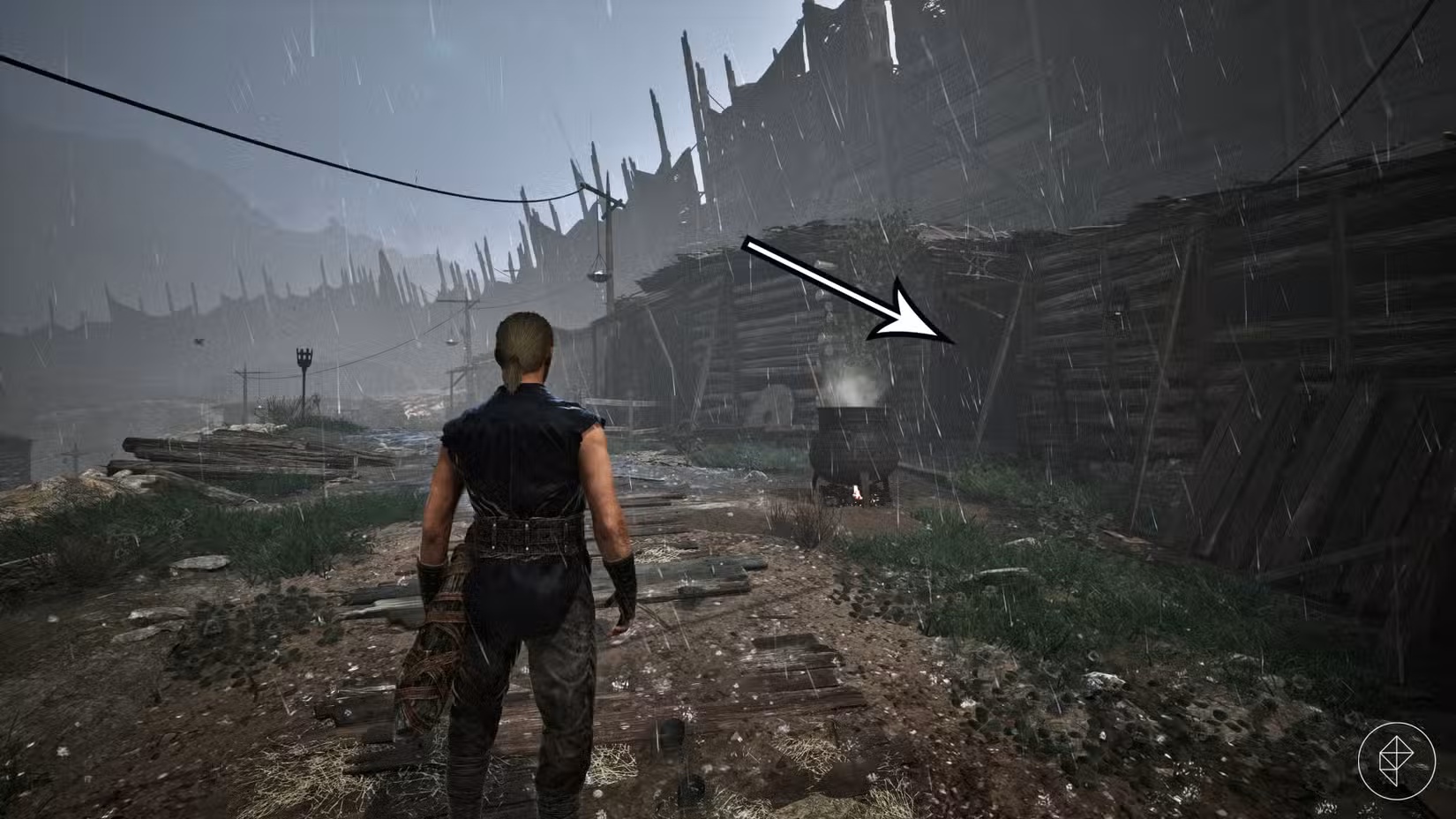 Uma seta aponta para a cabana do cartógrafo Graham em Gothic 1 Remake.