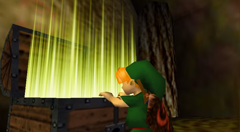 a lenda de zelda ocarina of time - link abre baú