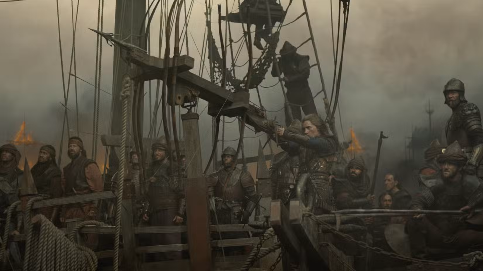 Sharako Lohar (Abigail Thorn) mira um escorpião no convés do Bitchfist durante A Batalha da Goela na 3ª temporada de House of the Dragon.