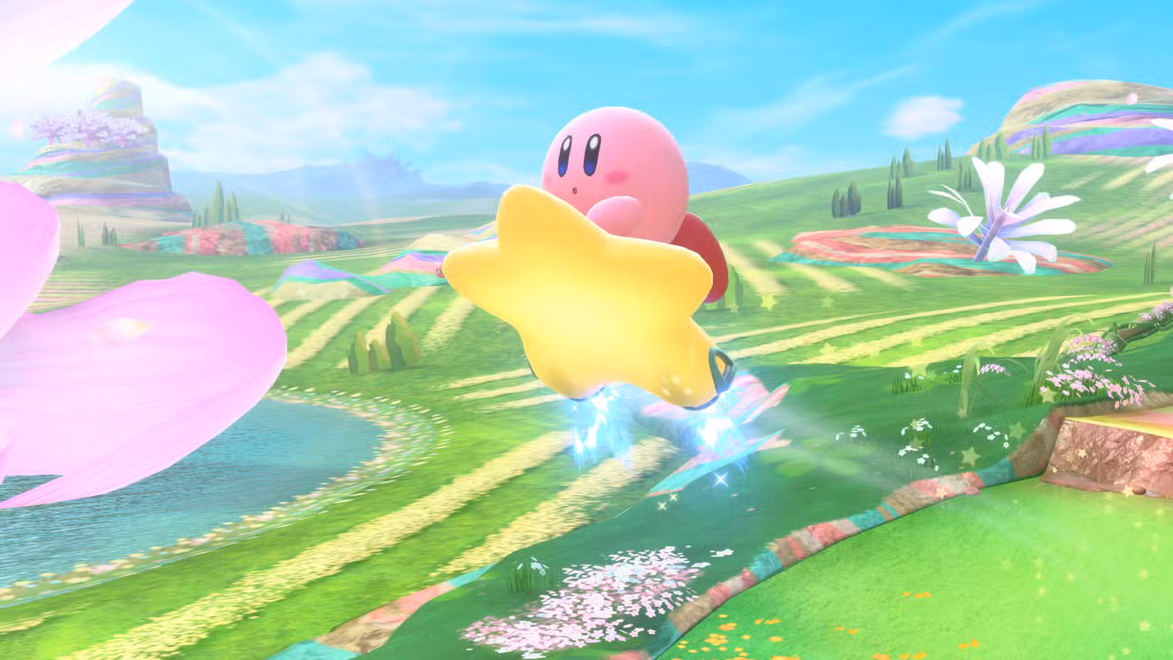 Kirby voa alto sobre uma paisagem colorida na máquina estelar em Kirby Air Riders