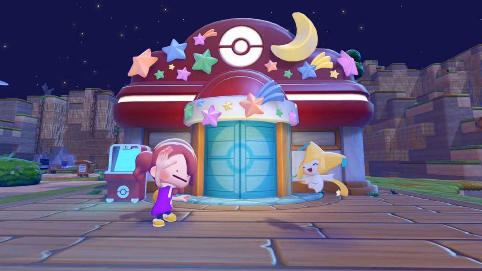 Pokémon Pokopia Ditto e Jirachi em frente a um Centro Pokémon decorado