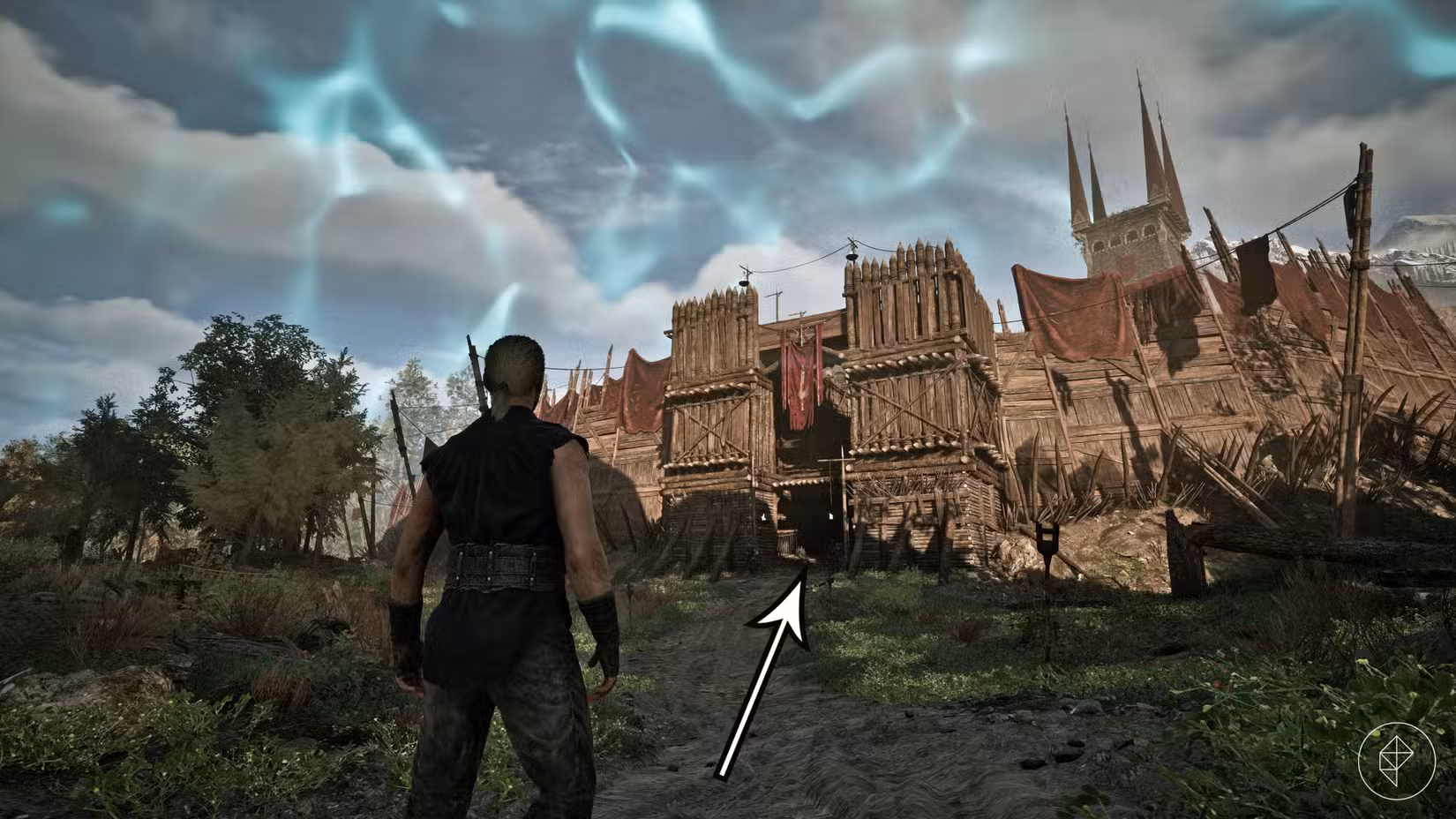 Uma seta aponta para o portão norte do Old Camp em Gothic 1 Remake.