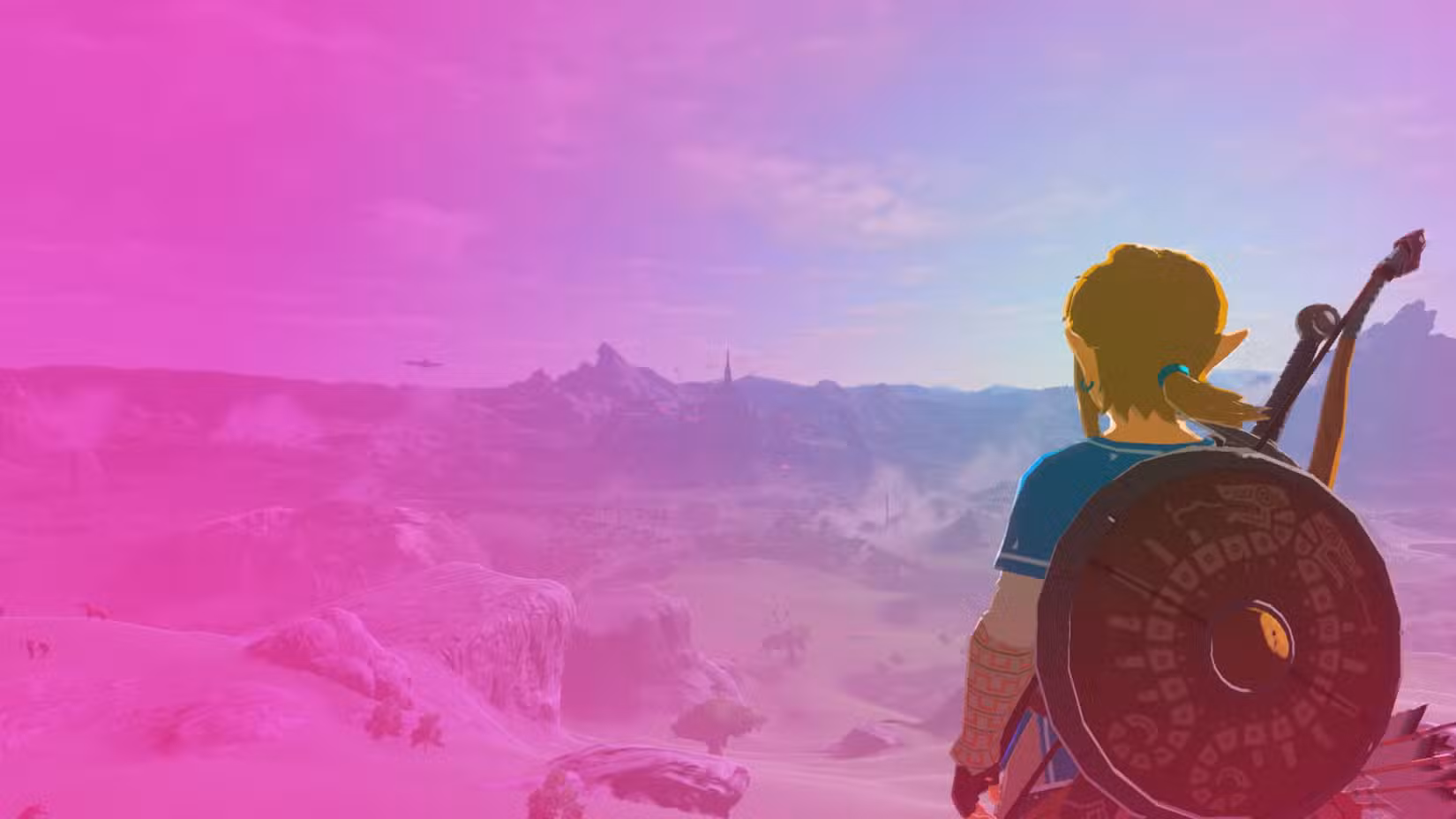 Link está na encosta de uma montanha, contemplando a vasta extensão de Hyrule em Breath of the Wild