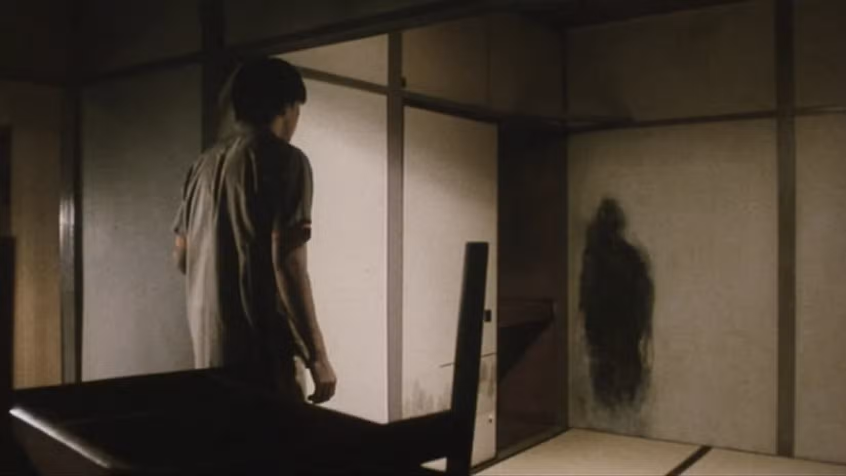 Ryosuke Kawashima (Haruhiku Kato) em Pulso (2001). 