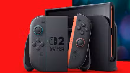 Um Switch 2 e 2 Joy-Con encaixado no punho magnético