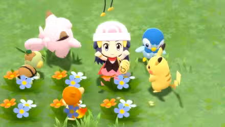 O personagem principal sentado ao lado de Pikachu e amigos em um canteiro de flores em Pokémon Brilliant Diamond e Pokémon Shining Pearl