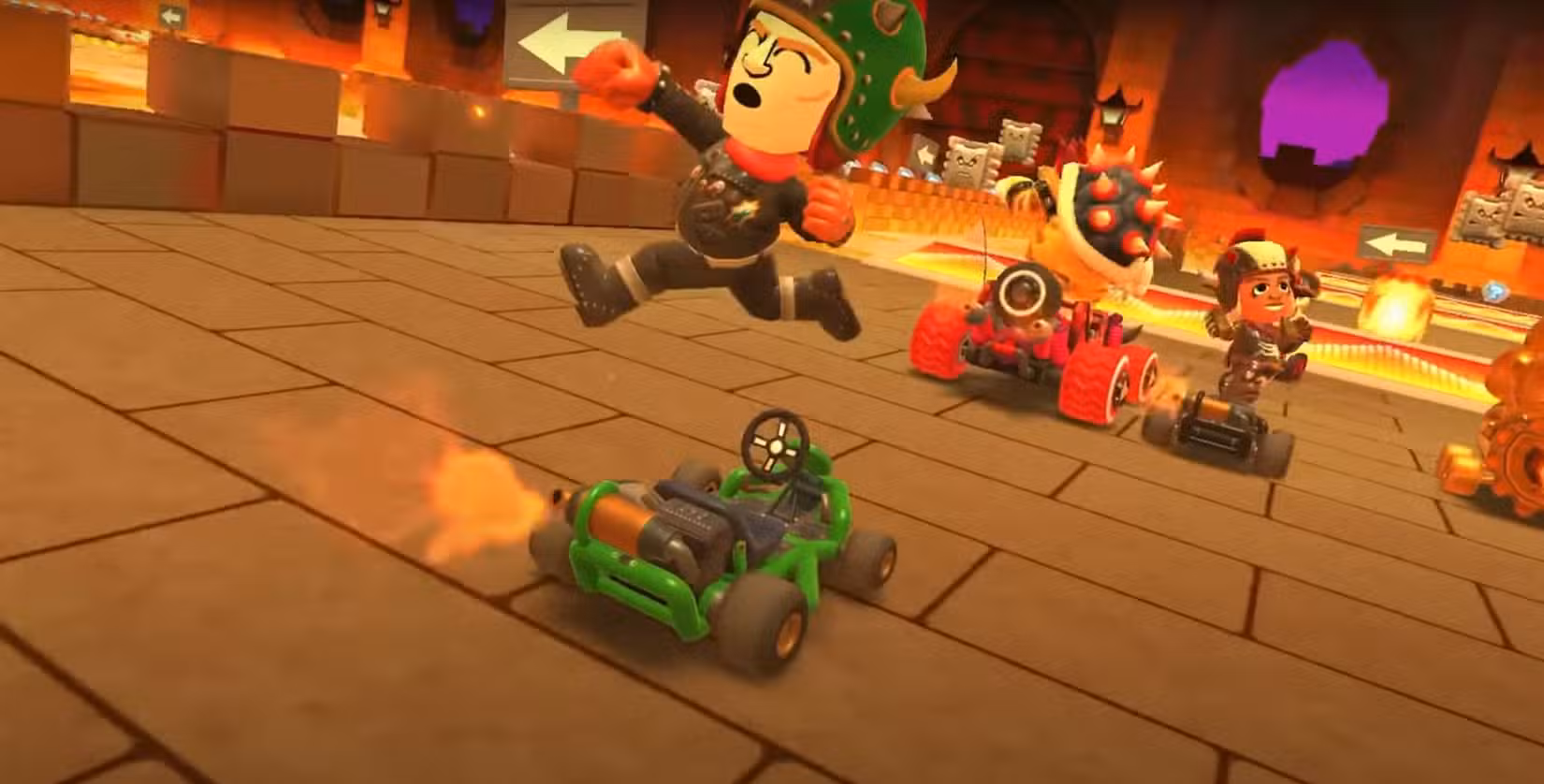 Um Mii usando o traje Mario Kart Tour Bowser Tour durante uma corrida no GBA Bowser Castle 3 